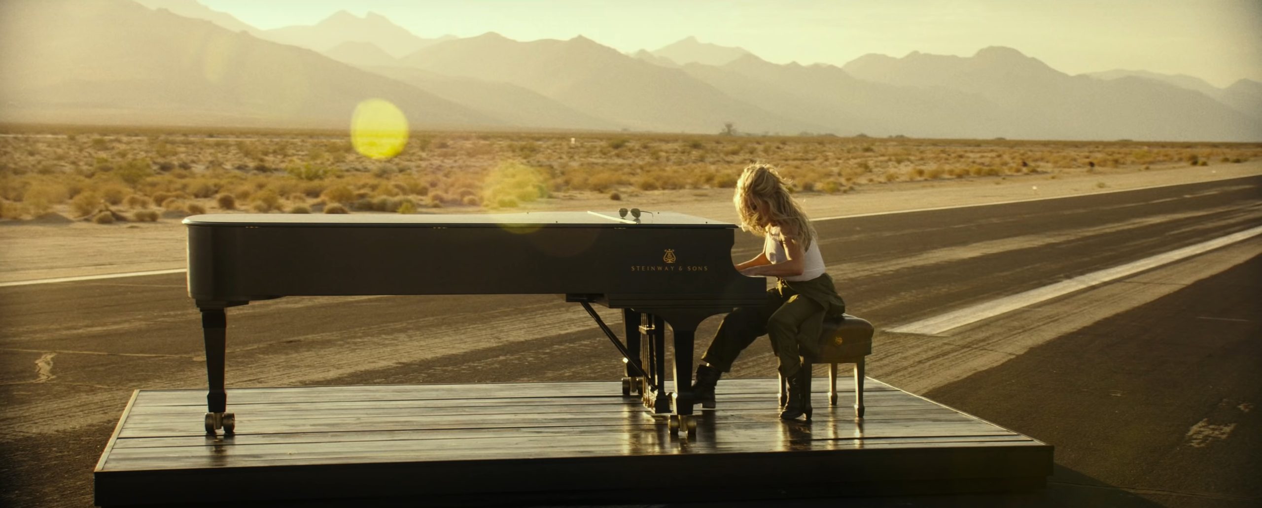 Lady Gaga playing a Steinway Model D grand piano in Hold My Hand video