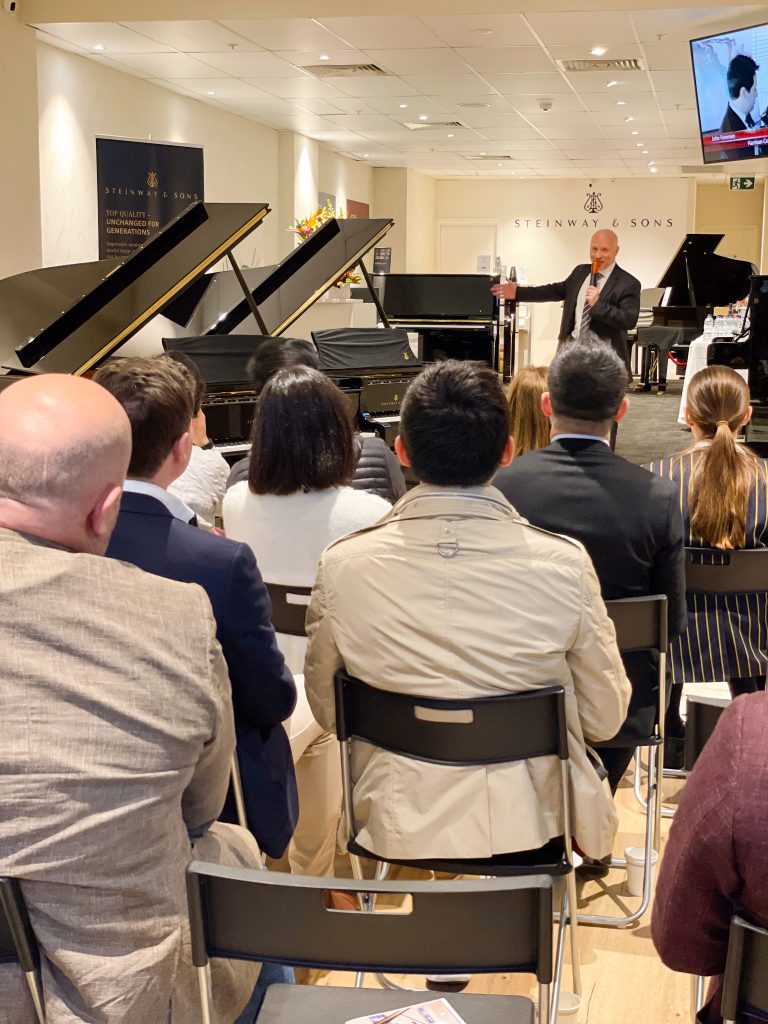 Steinway Galleries Australia CEO Mark O'Connor demonstrating the Steinway Spirio to the guests.
