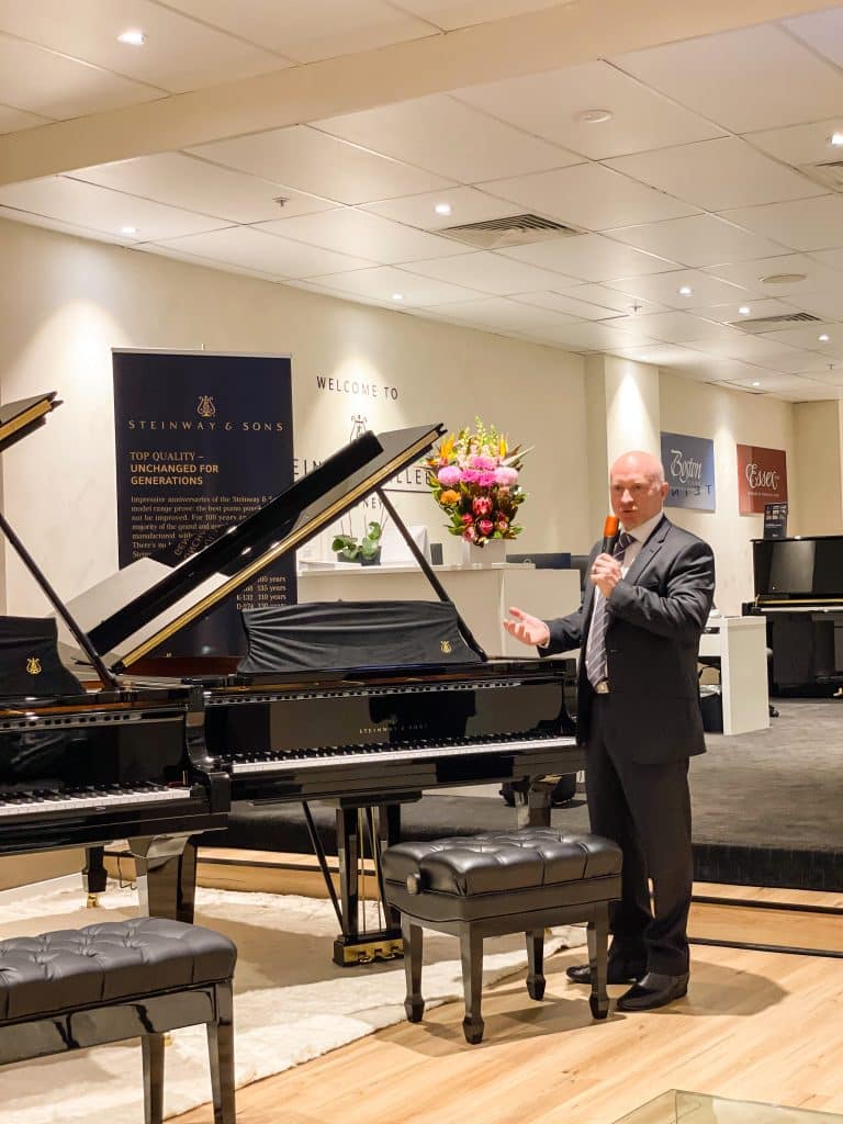 Steinway Galleries Australia CEO Mark O'Connor speaking during the Steinway Evening event, at the new-look Steinway Gallery Sydney