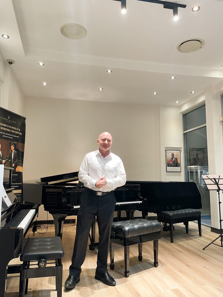 Steinway Galleries Australia CEO Mark O'Connor giving his welcoming remarks in Steinway's 170th Anniversary Celebration at Steinway Piano Showroom Sanctuary Cove