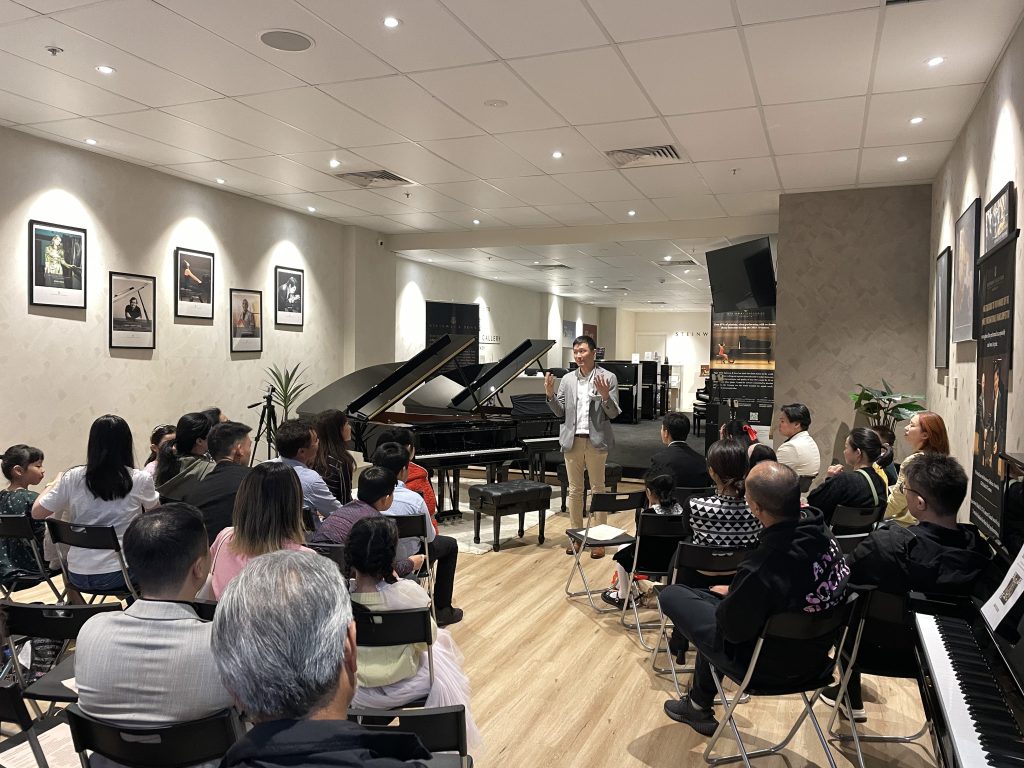 Piano Teacher Scott Lam addressing the audience - Scott Lam Student Recital at Steinway Gallery Sydney