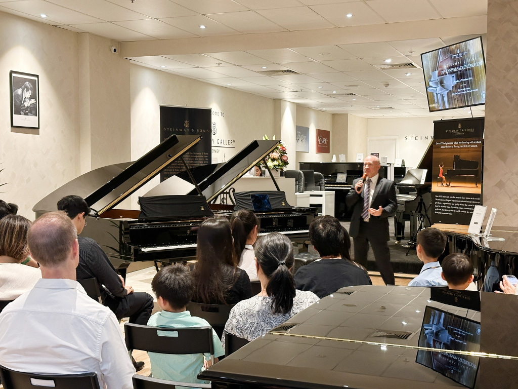 Steinway Galleries Australia CEO Mark O'Connor welcoming guests at Steinway Gallery Sydney's celebration of Steinway & Sons' 170th anniversary.