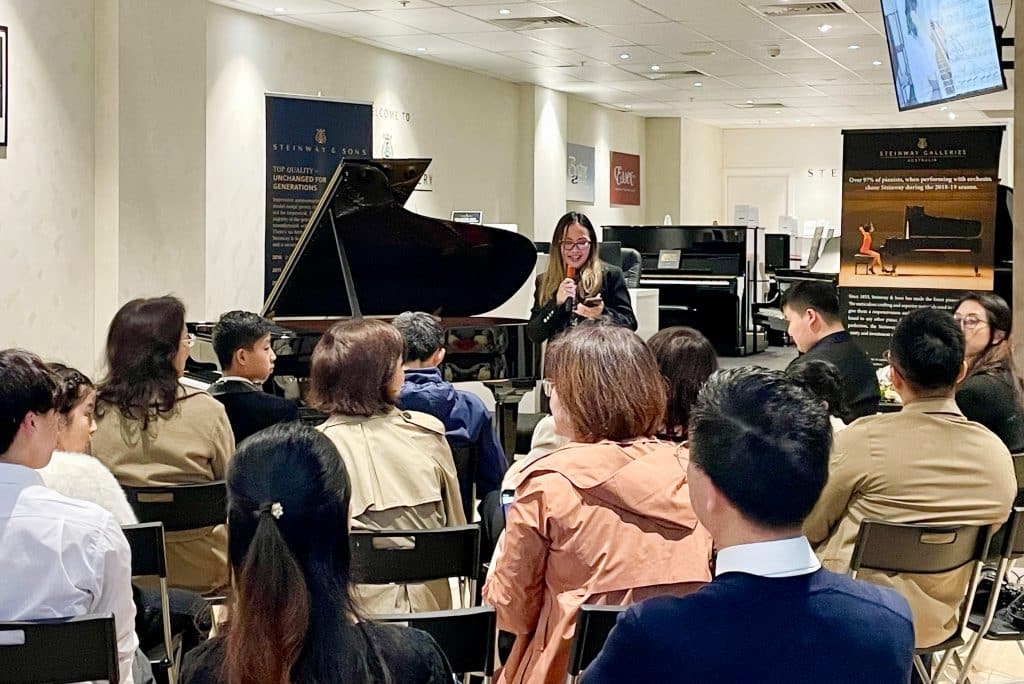 Sales Manager June O'Connor welcoming the audience at Steinway Gallery Sydney's Autumn Concert.
