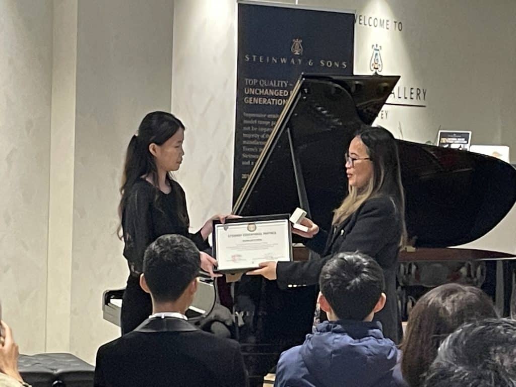Sales Manager June O'Connor and Steinway Teacher & Educational Partner Silvina Wong.