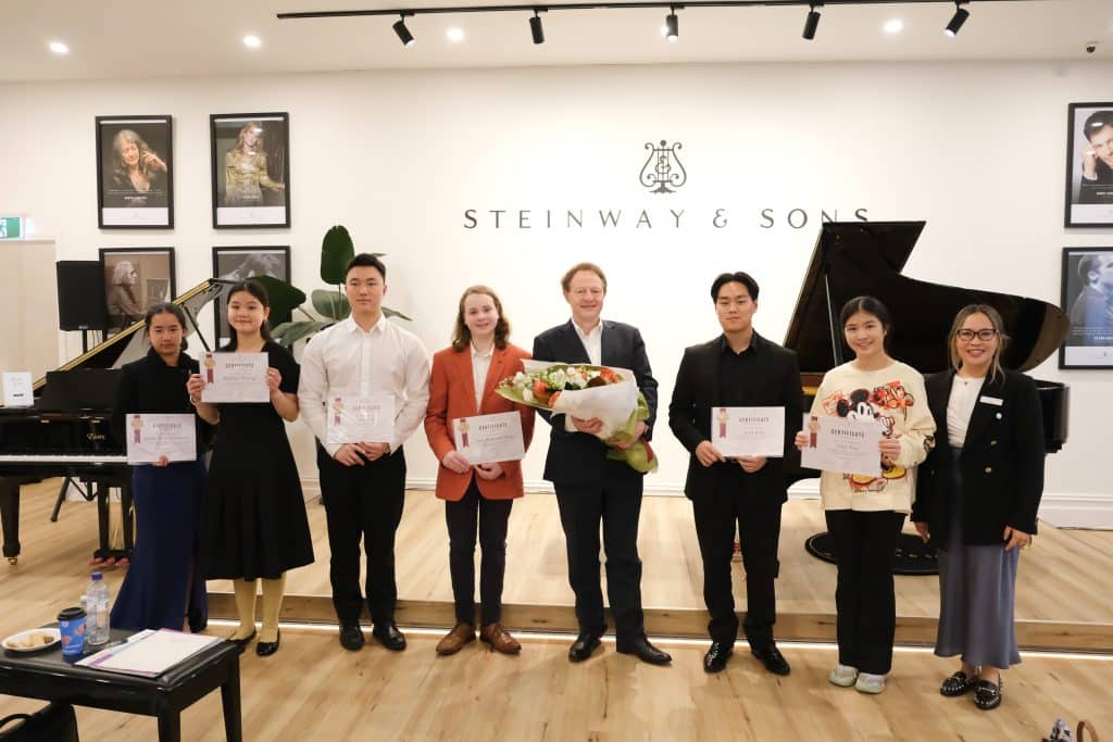 Steinway Artist Andreas Boyde, Sale Manager June O'Conner and participants.