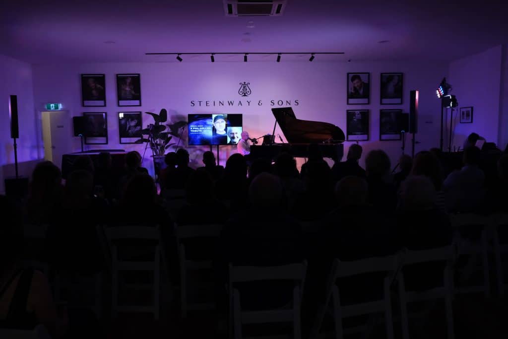 Phil Collins Tribute Event at Steinway Gallery Melbourne. CEO Mark O'Conner is performing on the Steinway & Sons piano.